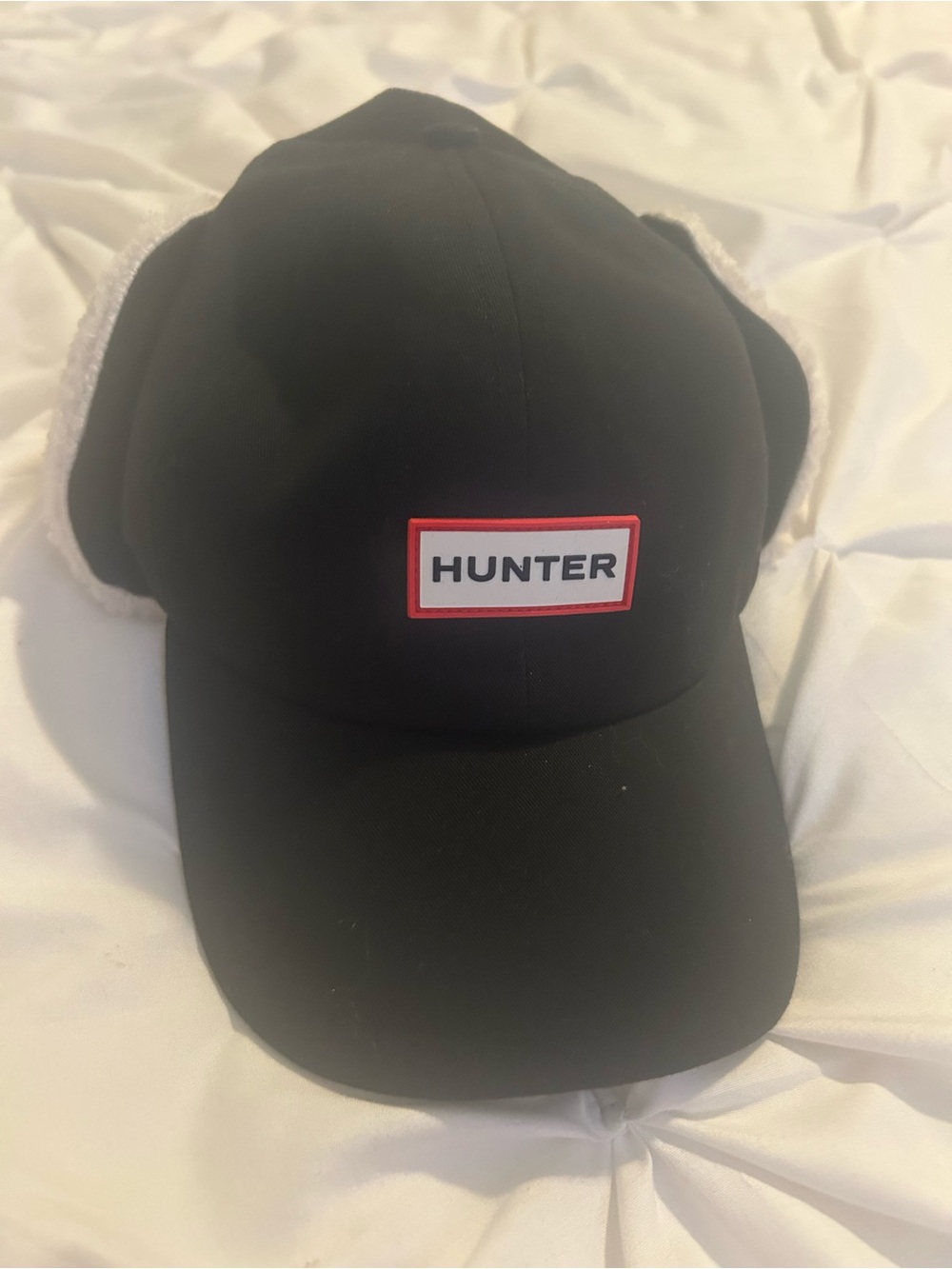 Hunter Black Cap with Red-Trim Logo and Ear Flaps